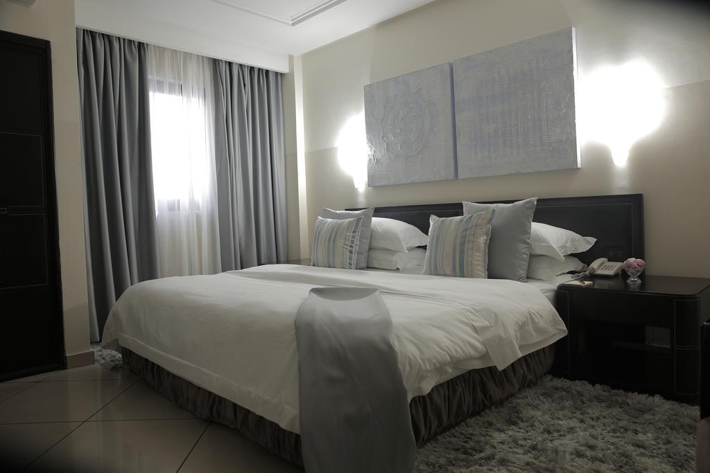 Oak Plaza Hotels East Airport Acra Quarto foto